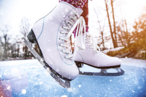 white ice skates shown outdoors