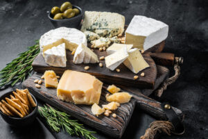 variety of cheeses on a board